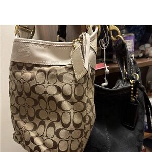 1 Coach Beige and 1 Black Signature Shoulder Bag